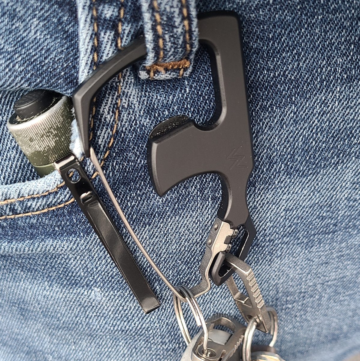 C33 carabiner, black, on a belt loop